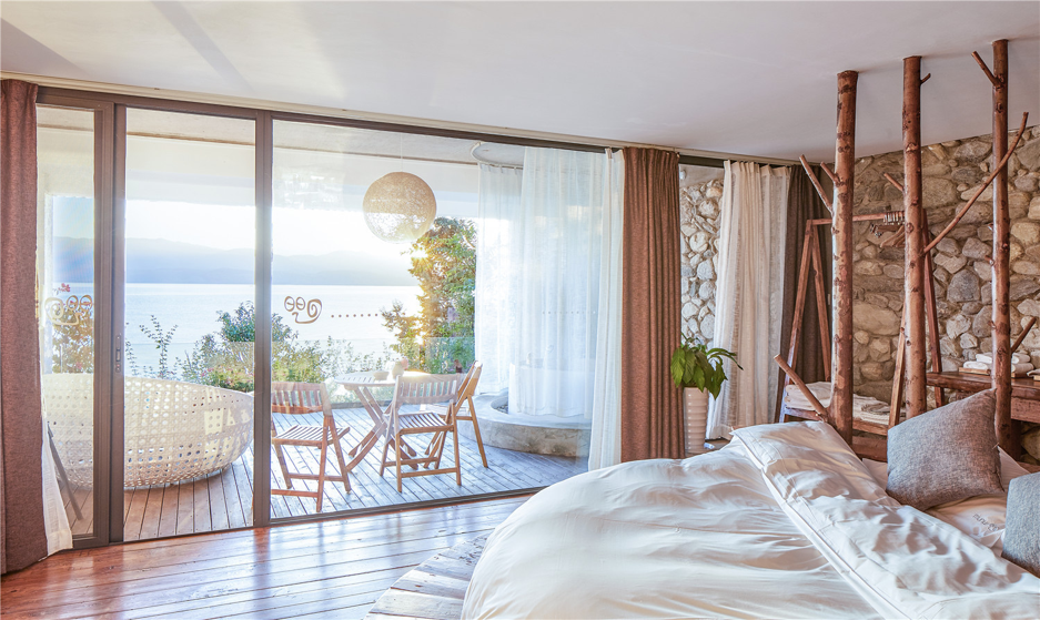 原木風(fēng)格民宿裝修設(shè)計,回歸自然之美